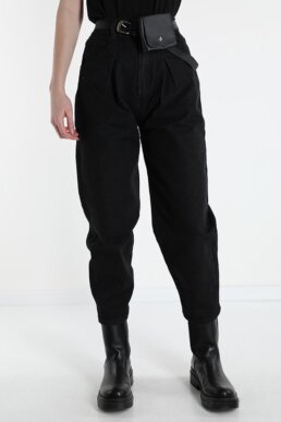 Black carrot black denim jeans with black belt bag